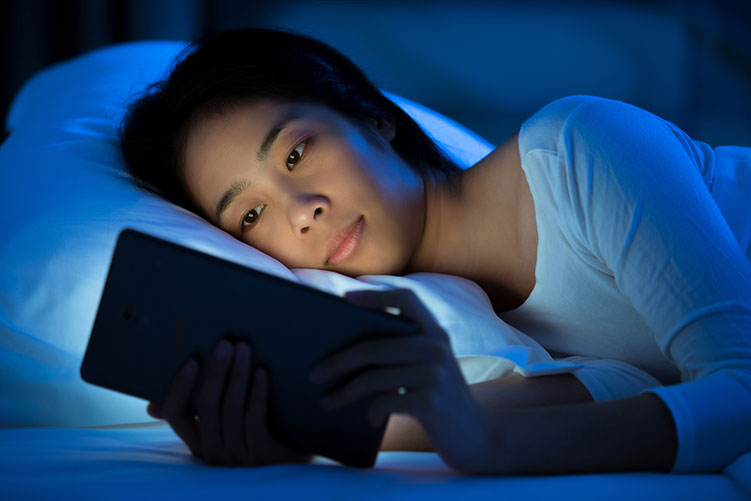 woman tablet in bed